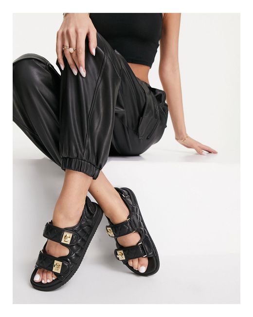 TRAVEL Sandales Steve Madden en coloris Noir Femme Chaussures Chaussures plates Sandales plates 