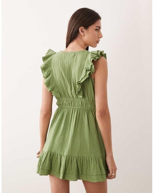 Wednesday's Girl Green Ruffle Edged Mini Dress