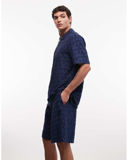 True Religion Blue Textured Terry Towelling Logo Shorts for men