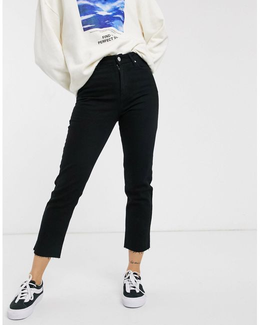 black raw edge jeans