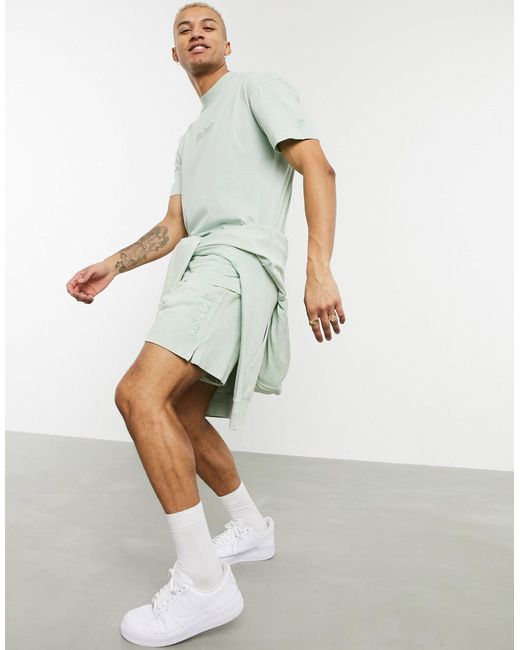 Nike – just do it – verwaschene shorts in Green für Herren