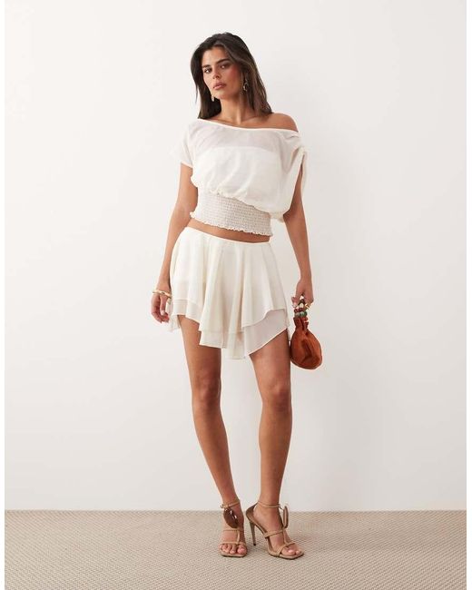 The Frolic Natural Exclusive Chiffon Asymmetric Tiered Frill Mini Skirt