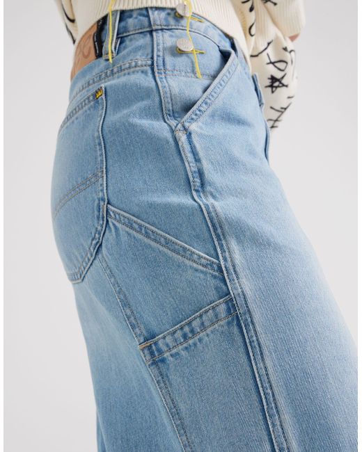 X jean-michael basquiat - capsule - jeans larghi lavaggio chiaro con motivo artistico sul risvolto di Lee Jeans in Blue