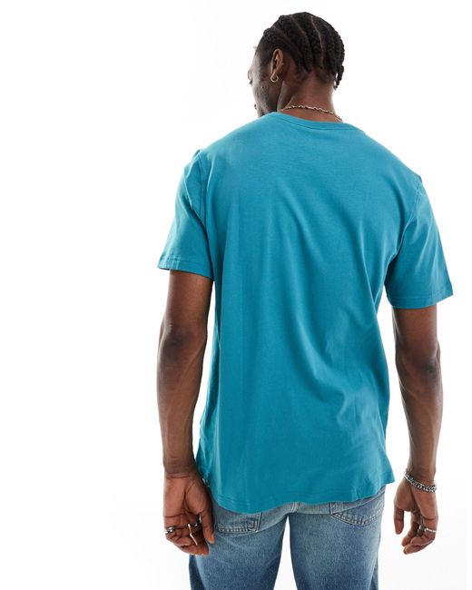 Camiseta color cerceta unisex con estampado gráfico Adidas Originals de color Blue