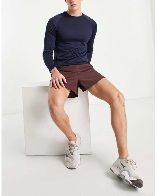 Top HIIT pour homme en coloris Blue