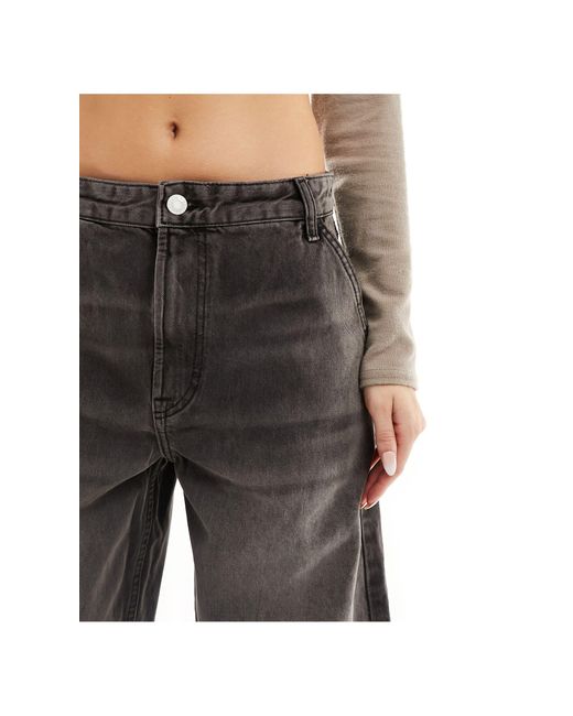 Jeans stile skater scuro di Bershka in Gray