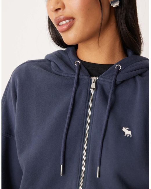 Sweat à capuche zippé en polaire avec logo emblématique Abercrombie & Fitch en coloris Blue