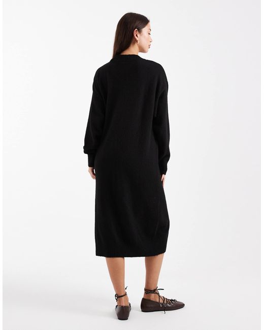 Robe pull mi-longue en maille avec manches longues Monki en coloris Black