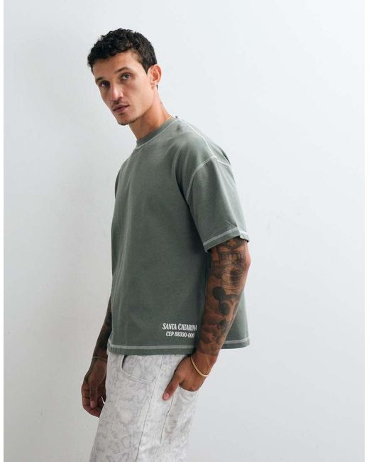 CERNUCCI Green Movie Theatre Back Graphic Boxy T-Shirt for men