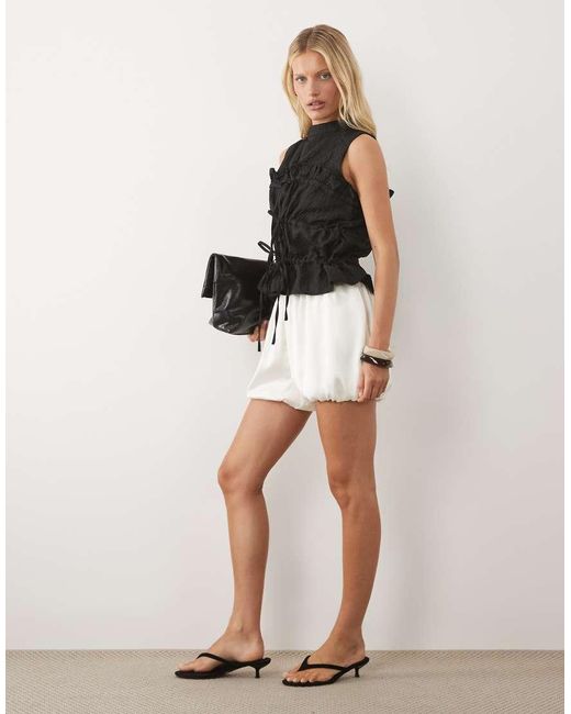 Ghospell Black Amina High Neck Sleeveless Drawstring Top
