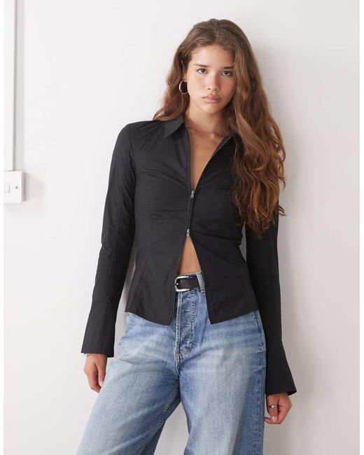 Camisa Negra Con Mangas Acampanadas Y Cremallera De Weekday de color Blue