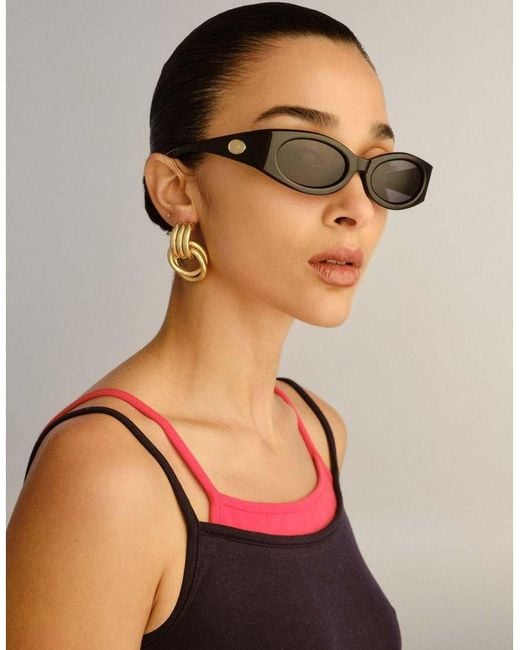 Glaciem di Le Specs in Brown