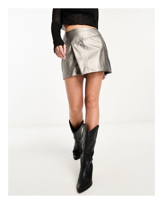Mini-jupe portefeuille en similicuir - acier métallisé ASOS en coloris Noir  | Lyst