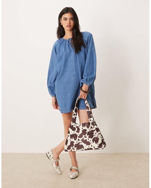Robe courte en jean avec manches ballon - clair vintage ASOS en coloris Blue
