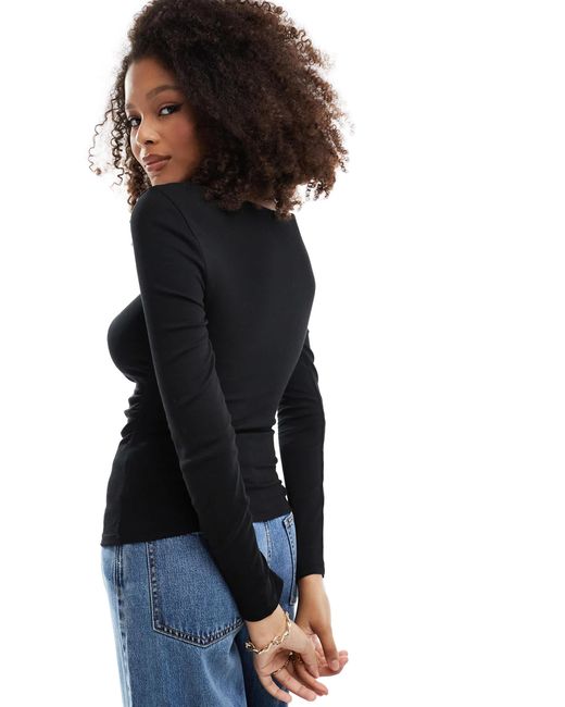 Top froncé à encolure bateau Stradivarius en coloris Blue
