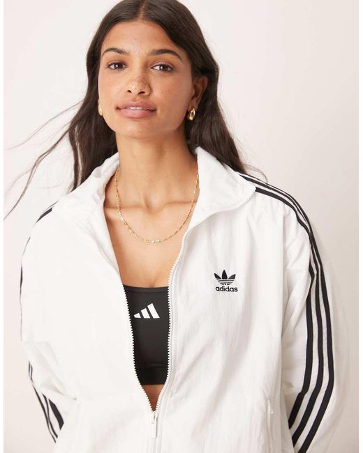Chaqueta De Chándal Blanca De Tejido Liso Firebird De -Blanco Adidas Originals de color White