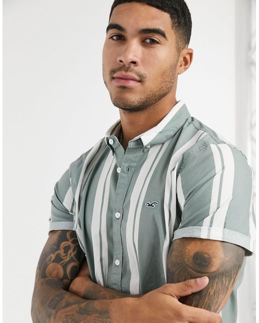 Camisa slim en color verde blanco a rayas con logo ic nico