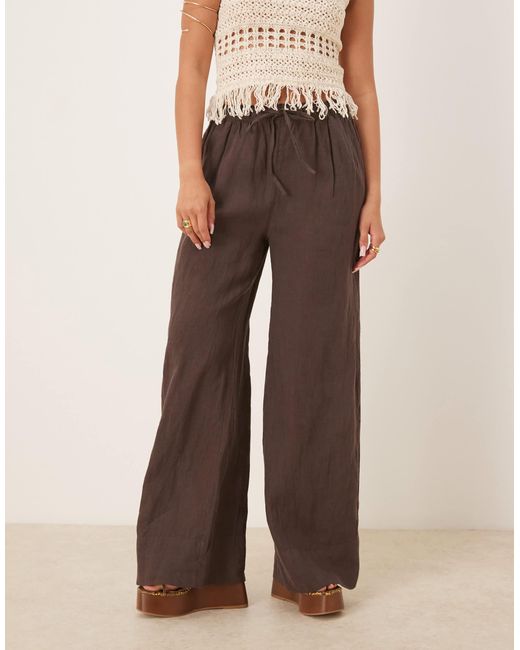 Pantalon large en lin Gina Tricot en coloris Brown