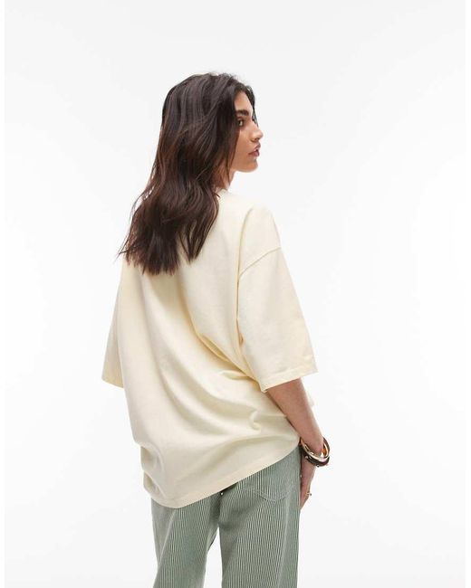 T-Shirt Oversize Color Latticello Con Stampa Ricamata “Arizona” di TOPSHOP in White