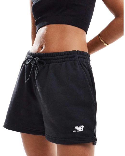 Sport essentials - short en tissu éponge New Balance en coloris Black