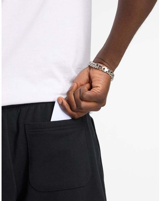 New Balance Black Athletics French Terry Short 5" for men