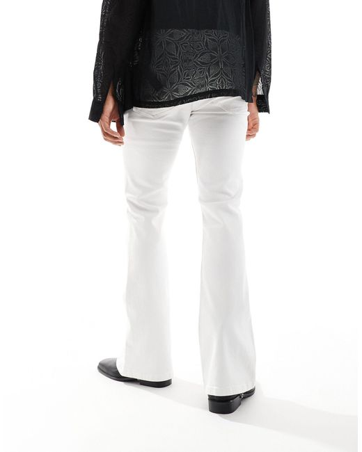 Jeans a zampa elasticizzato bianchi di ASOS in Black da Uomo