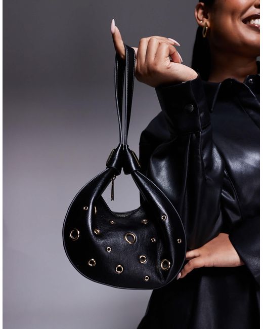 ASOS Black Interchangeable Shoulder And Cookie Clutch Bag With Eyelet Studs