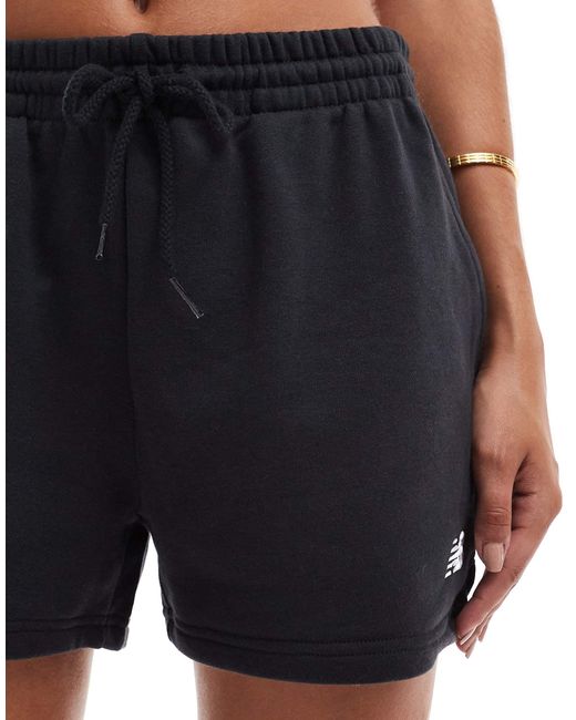 Sport essentials - short en tissu éponge New Balance en coloris Black