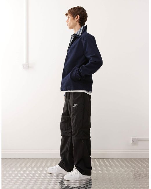 Umbro – locker geschnittene jogginghose mit reißverschluss in Blue für Herren