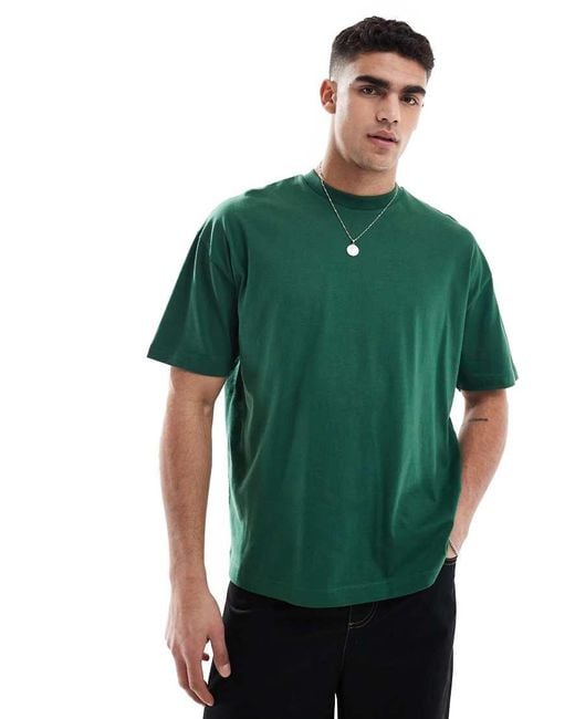 Camiseta Verde Extragrande Con Estampado Gráfico De Texto En La Espalda De ASOS de hombre de color Green