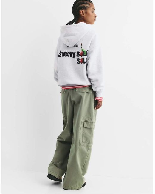 Felpa Mélange Con Grafica Con Ciliegie di Pull&Bear in White