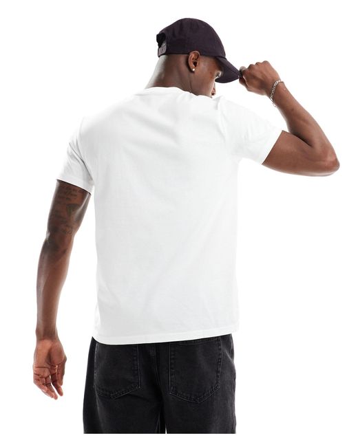 T-shirt bianca con corona di alloro floccata di Fred Perry in White da Uomo