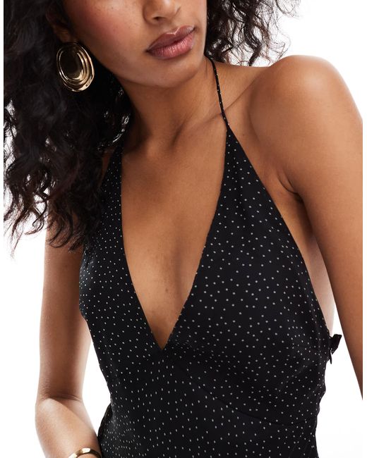 Robe longue dos nu à volants et ourlet asymétrique - noir à pois ASOS en coloris Black