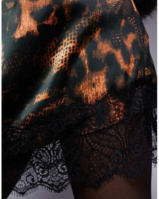 Bowknot leopard print lace hem ribbon mini skirt