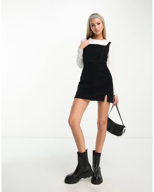 Don't Think Twice Black Dtt – estella – figurbetontes latzkleid aus em cord