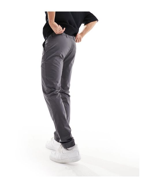Chino elasticizzati slim di Calvin Klein in Black da Uomo