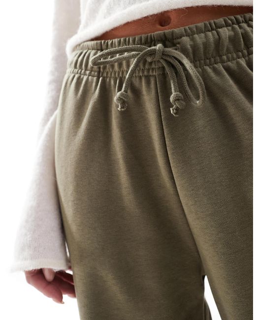 Stradivarius Petite joggingbroek Met Wijde Pijpen in het Groen Lyst NL