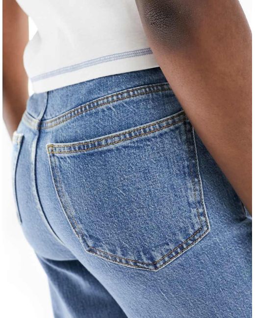 Vaqueros Elásticos De Pernera Recta Cómoda De Tall ASOS de color Blue