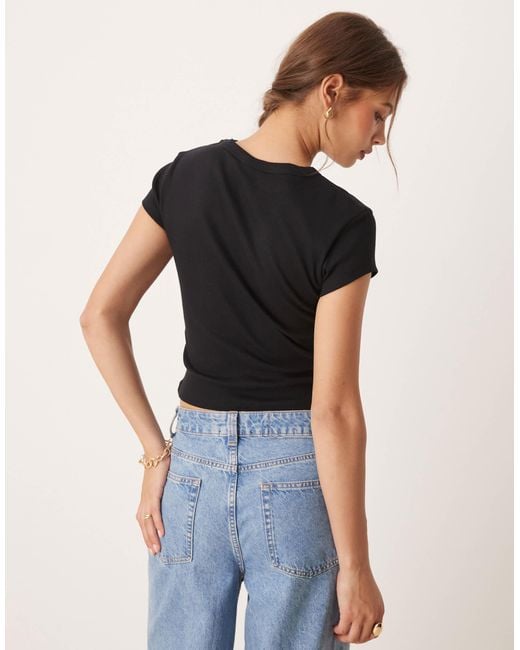 ASOS Black Baby Tee With Copenhagen Bleach Flower Graphic