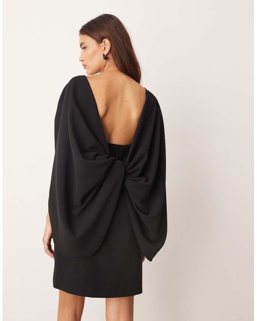 ARRANGE Black Cape Sleeve Mini Shift Dress With Metal Trim Detailing