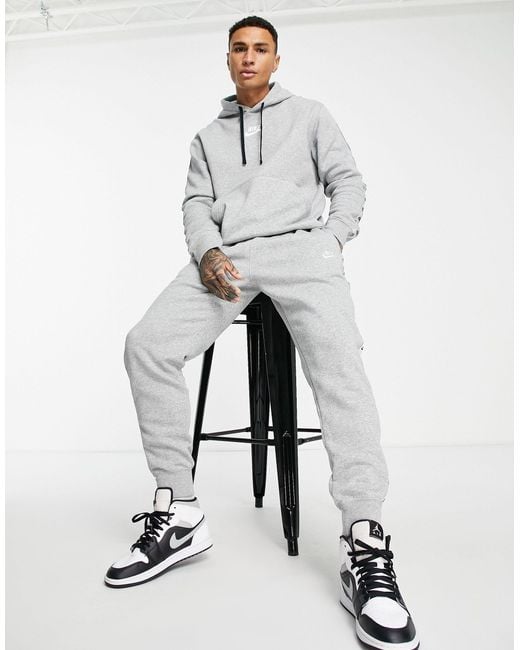 Nike White Repeat Logo Taped Fleece Tracksuit Set for men