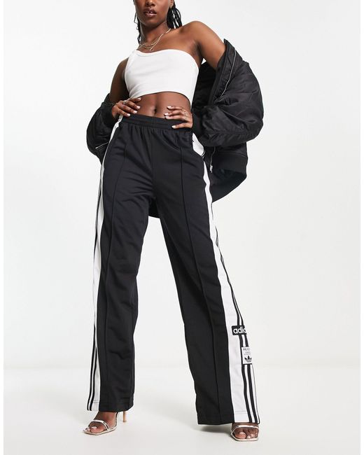 Adibreak - pantaloni sportivi neri con bottoni a pressione sui lati di  adidas Originals in Nero | Lyst