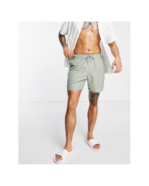 Pantaloncini da bagno medi color kaki chiaro da Uomo di ASOS in Verde | Lyst