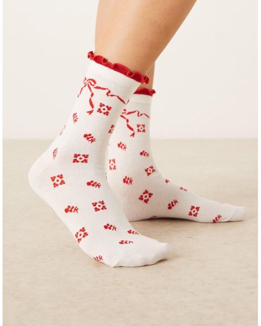 Accessorize Sokken Met Rode Strikjes in het Natural