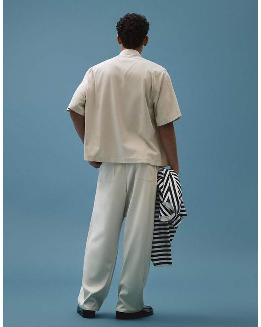 Bershka Blue Fluid Super baggy Darted Trousers for men