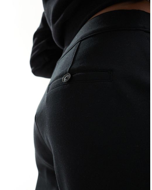 Pantalon ample en maille point Spanx en coloris Black