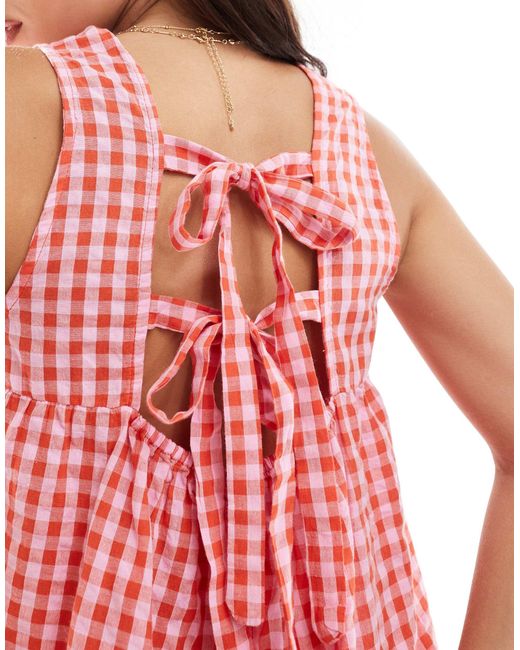 Robe courte sans manches en crêpe nouée dans le dos - vichy rose et Pieces en coloris Pink
