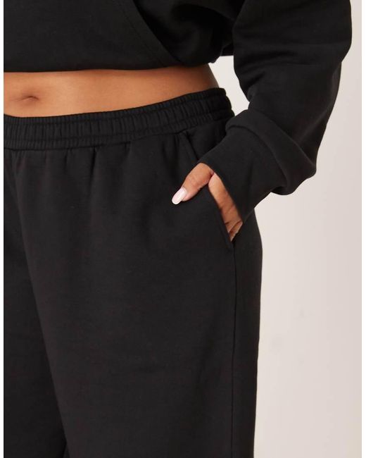 Joggers Negros De Pernera Ancha Con Interior Afelpado De Asos Design Curve ASOS de color Black