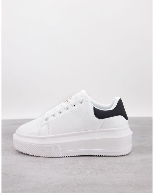 white thick sole trainers