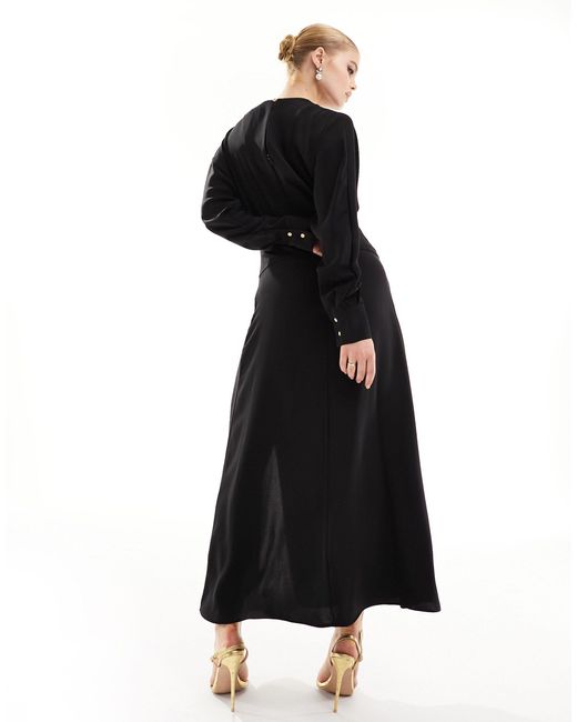 Robe mi-longue avec taille ajustée Mango en coloris Black